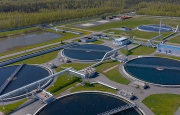 water treatment Aerial view of the wastewater treatment plant. Pumping station and drinking water supply. Industrial and urban water treatment for a big city. Round sedimentation tanks.